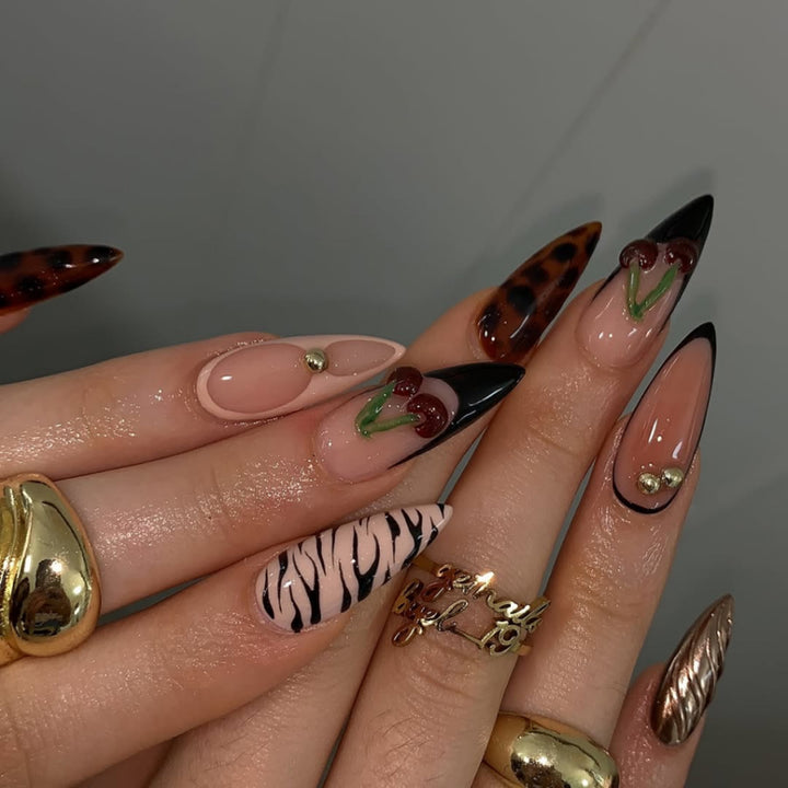 Artful stiletto nails with creative patterns Stornfield