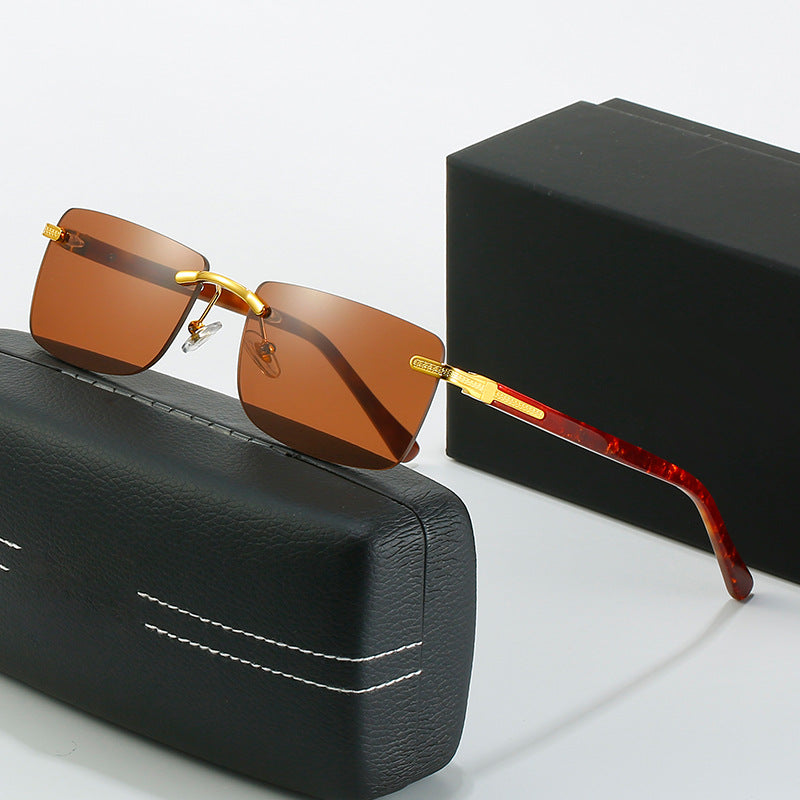 Women's fashionable sunglasses with a stylish, rectangular frame and elegant metal accents Stornfield