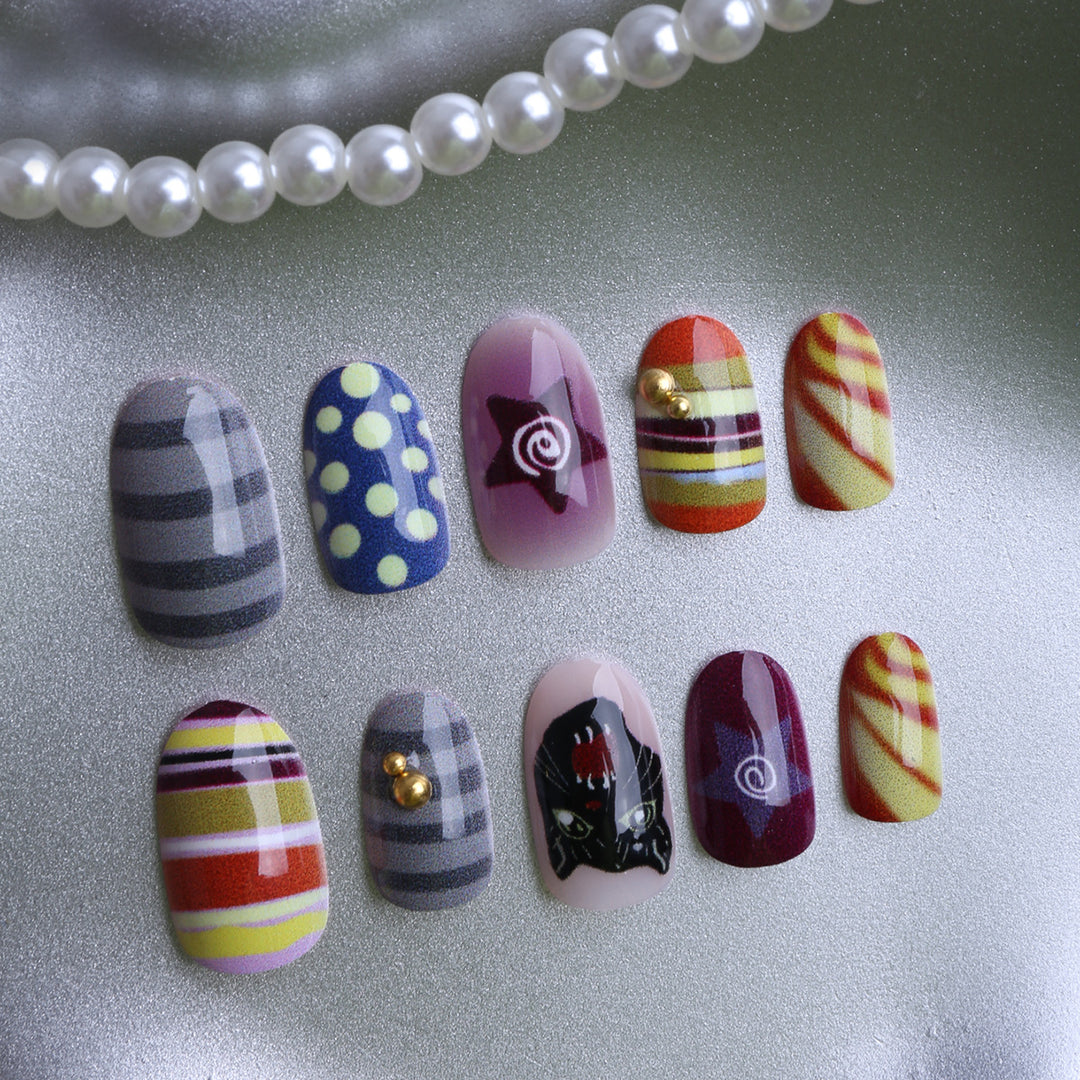 Artificial nails with creative patterns and unique details Stornfield