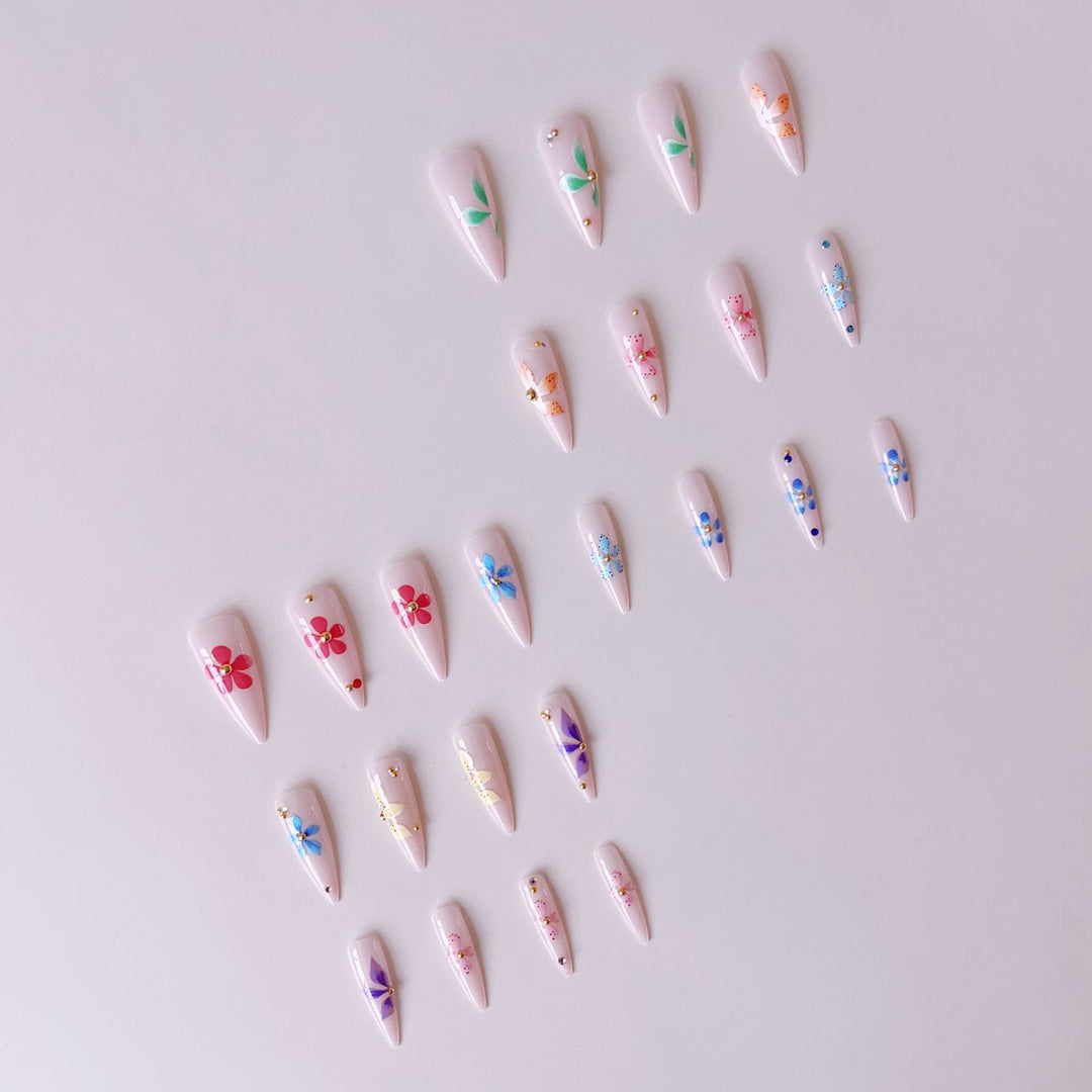 Artificial nail tips with floral decorations Stornfield