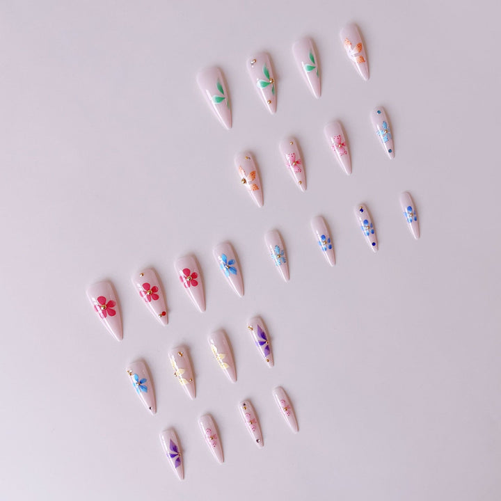 Artificial nail tips with floral decorations Stornfield