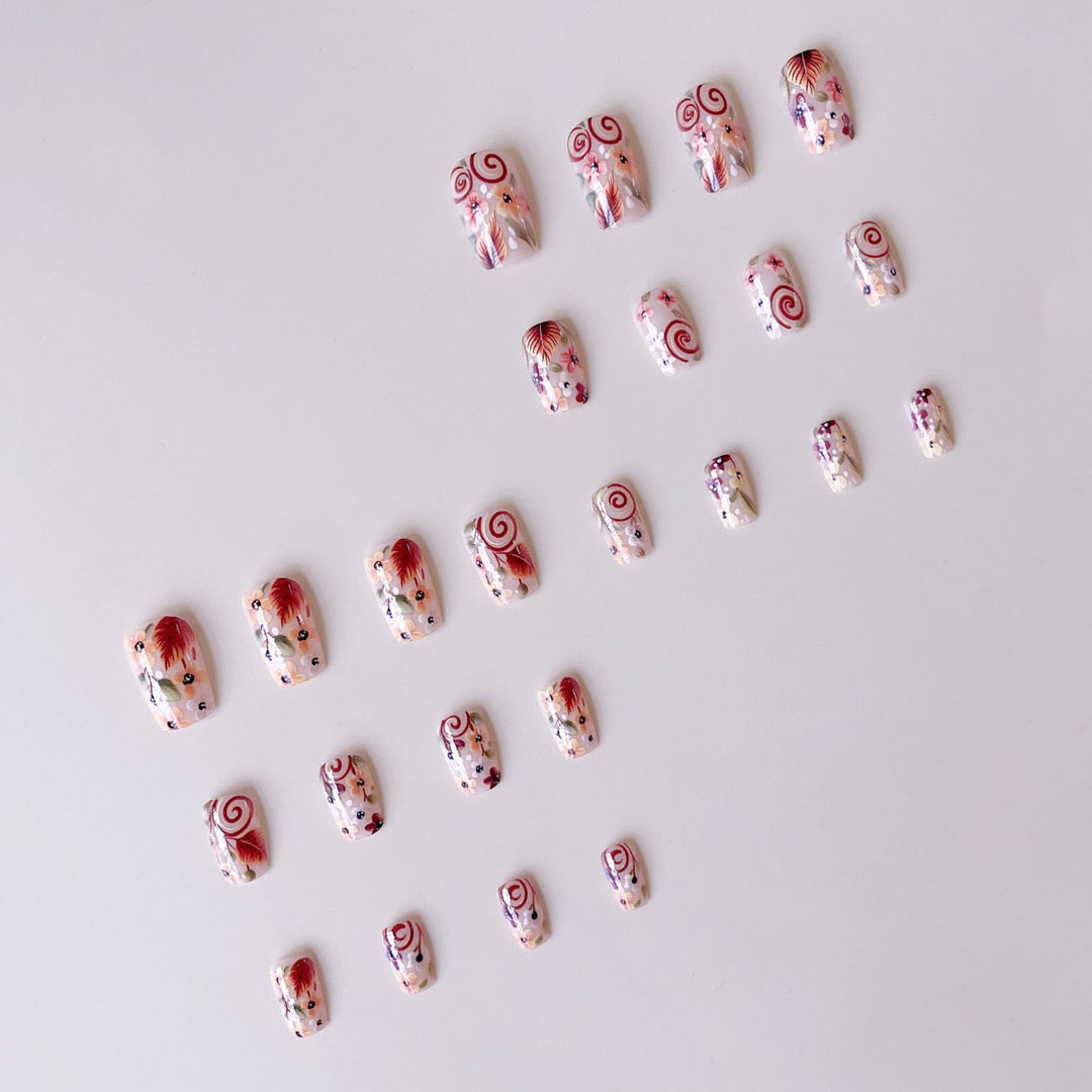 Artificial nail set with striking floral decorations Stornfield