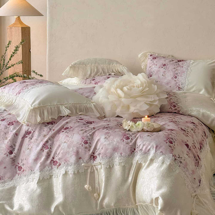 Romantic bedding and bedspread set with ruffles, lace trim, and floral quilting