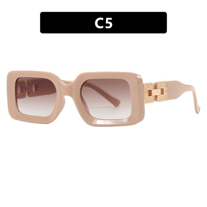 Women’s fashionable sunglasses in elegant square design with luxurious golden accents Stornfield