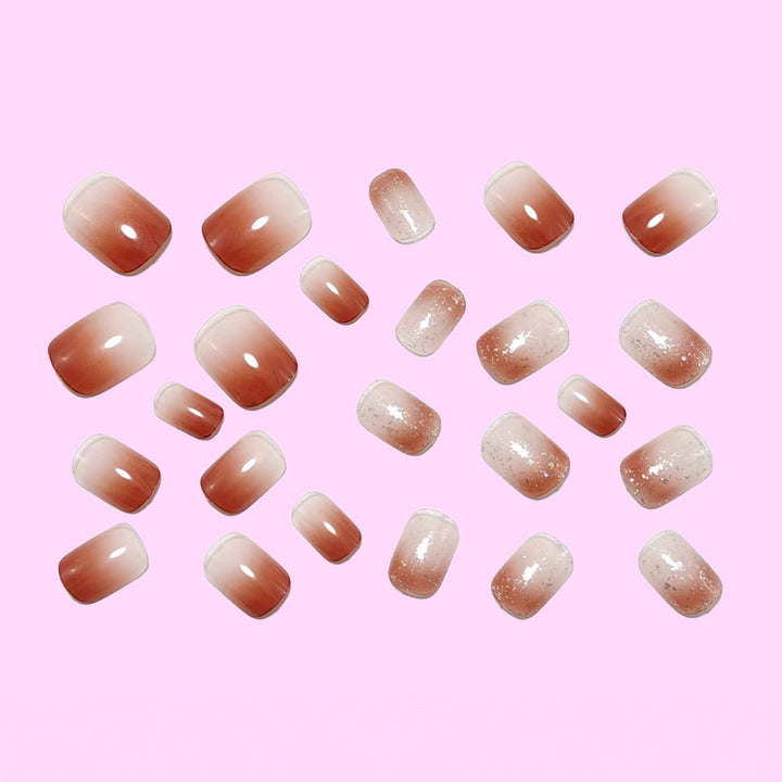 Art nails with delicate gradient colors and glitter effects Stornfield