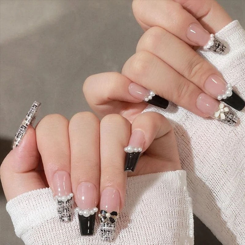 Glamorous artificial fingernails with glitter and moon designs Stornfield