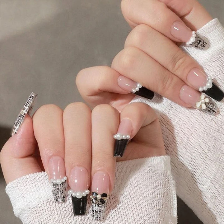 Glamorous artificial fingernails with glitter and moon designs Stornfield