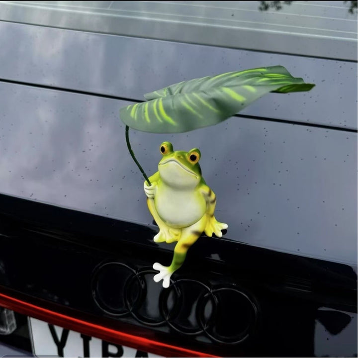 Funny frog figure with umbrella Stornfield