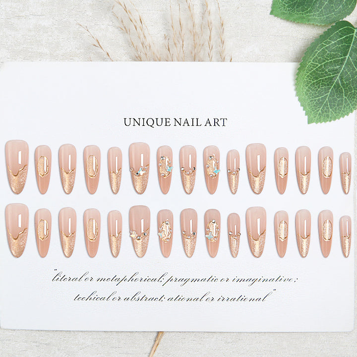 Art nail set with elegant gold glitter design Stornfield