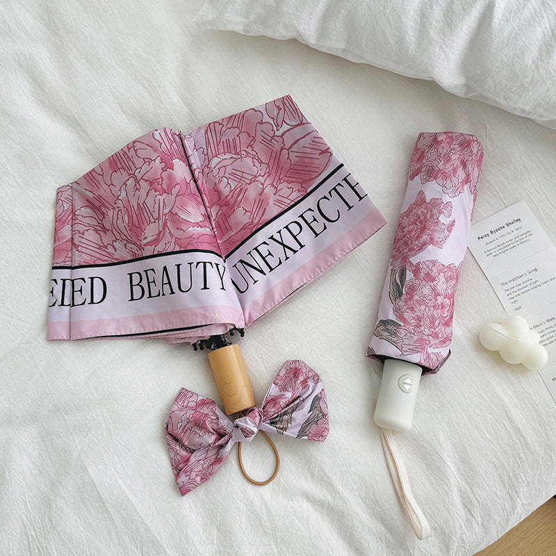 Women's compact umbrella with floral design Stornfield