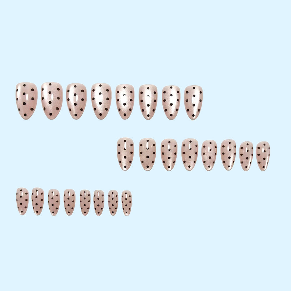 Artificial nails in modern polka dot design Stornfield