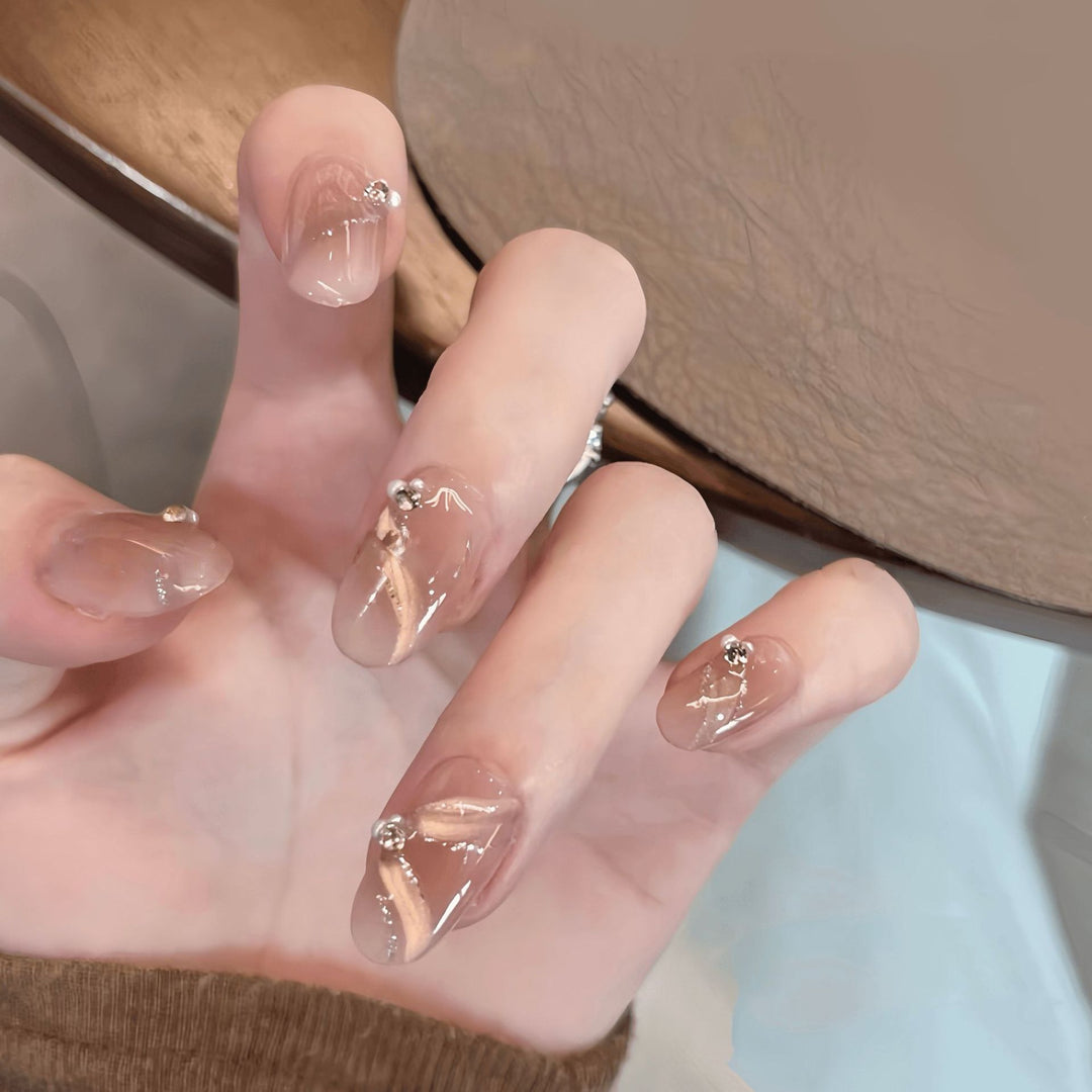 Artificial nails with elegant rhinestone accents Stornfield