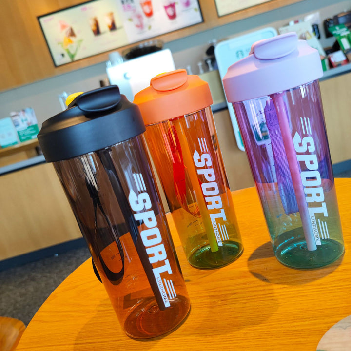 Women's sports water bottle with practical straw and carry function Stornfield