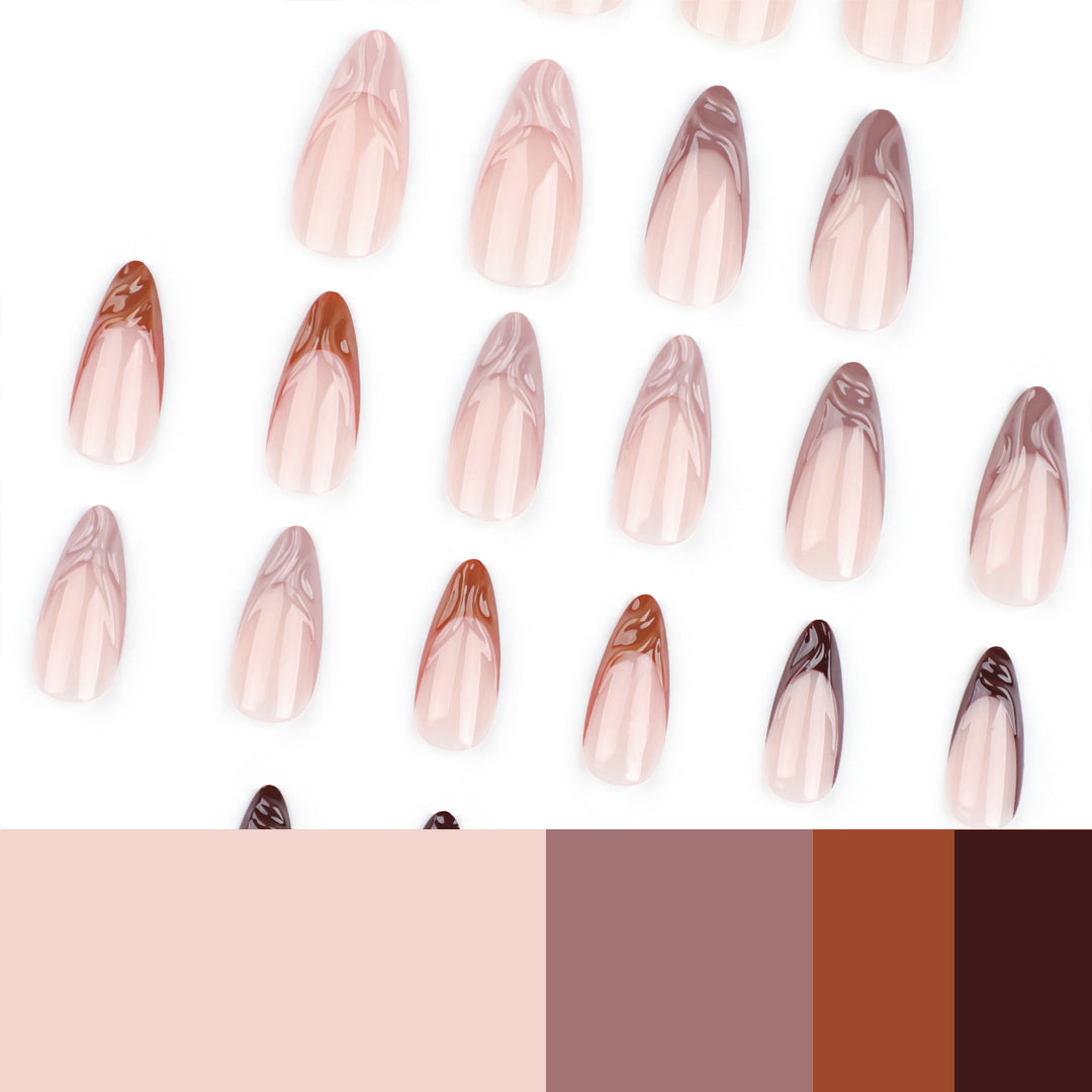 Artful stiletto nails with elegant gradient and glitter accents Stornfield