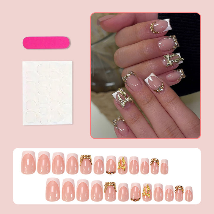 Nail art set with elegant glitter ornaments and stylish French tips Stornfield