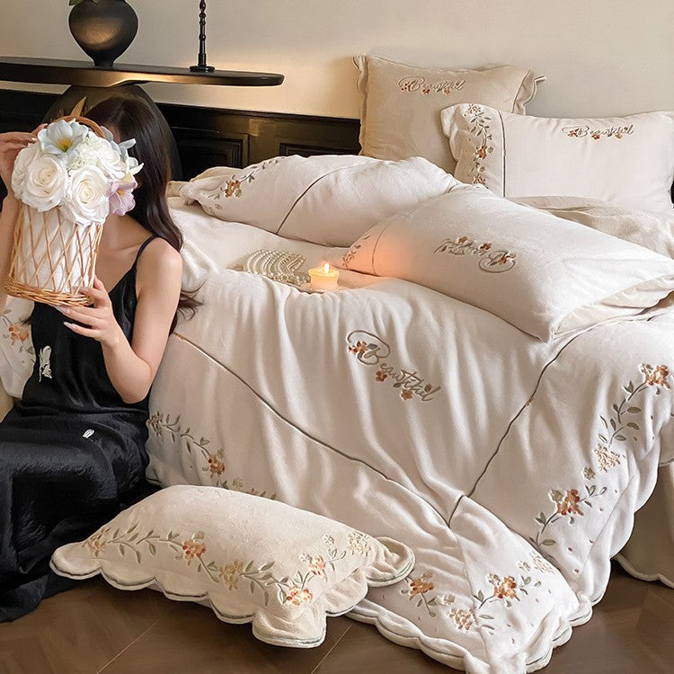 High-quality embroidered bedding set made of cotton percale with ruffled hem and floral relief