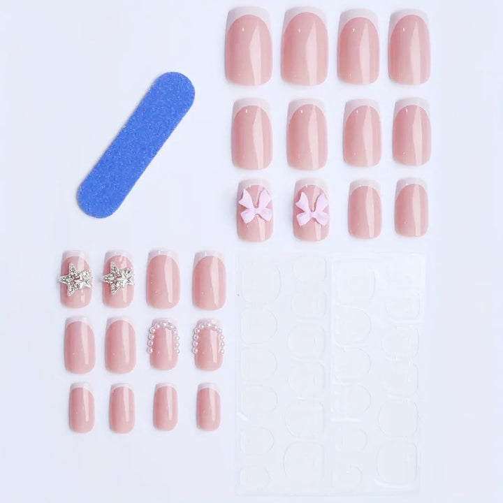 Artificial nail tips with glamorous bow and rhinestone design Stornfield