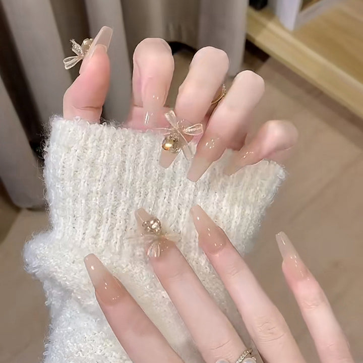 Artificial nail set with elegant 3D patterns and delicate accents Stornfield