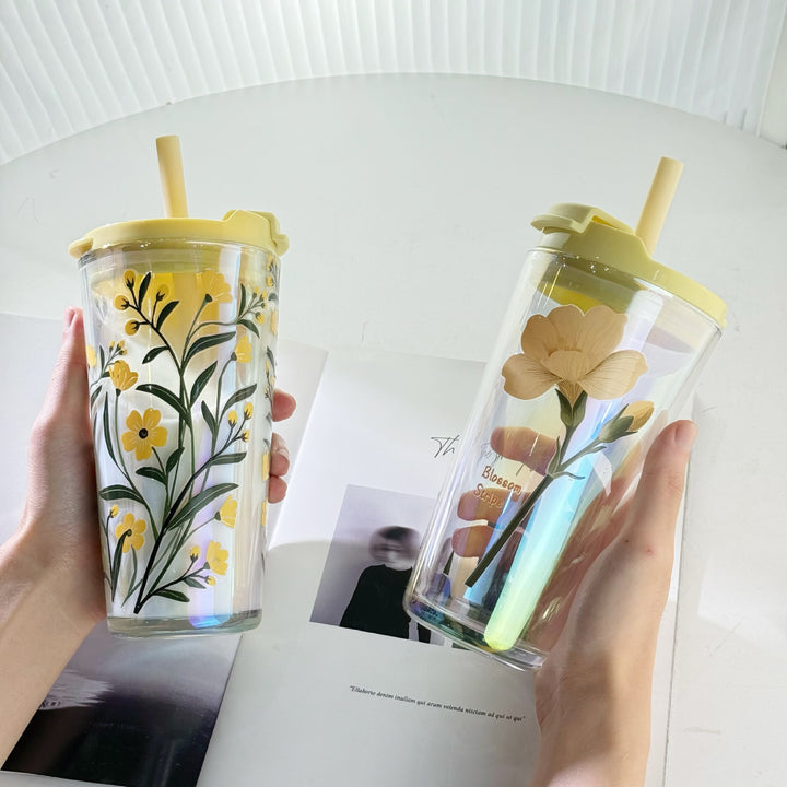 Women's drinking cup with practical silicone protective sleeve and decorative floral patterns Stornfield