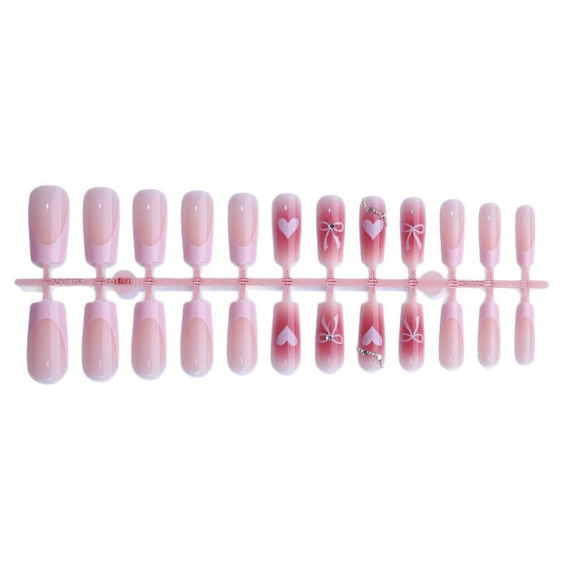 Nail art set with elegant bow and glitter motifs Stornfield