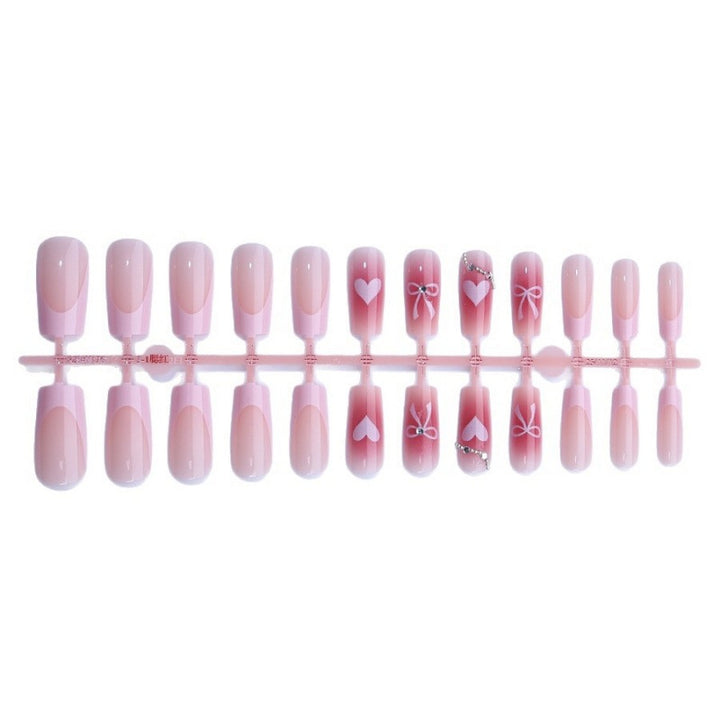 Nail art set with elegant bow and glitter motifs Stornfield