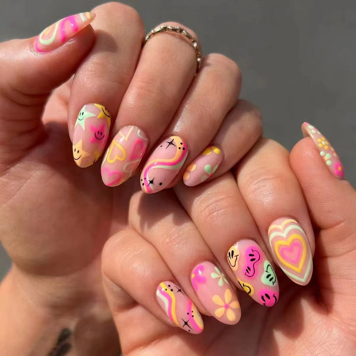 Nail set with playful 3D motifs and colorful designs Stornfield