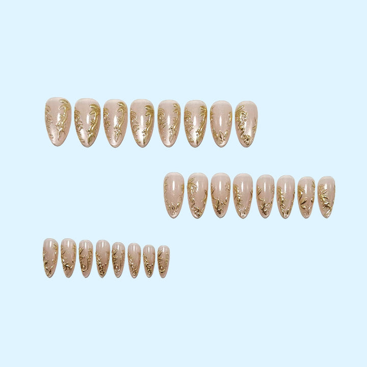 Glamorous artificial nails with delicate gold accents Stornfield
