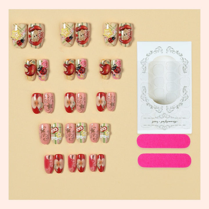 Creative nail art set with playful designs and glitter accents Stornfield