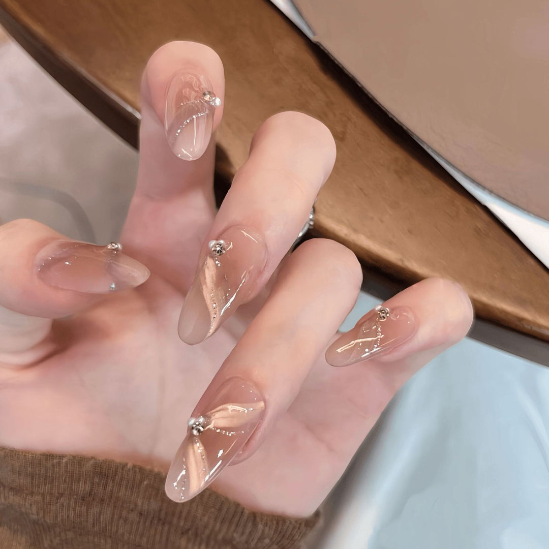 Artificial nails with elegant rhinestone accents Stornfield