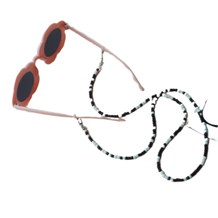 Sunglasses with fashionable pearl band Stornfield