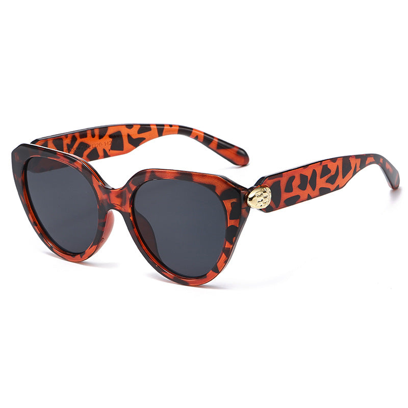 Ladies Cat-Eye Sunglasses with Golden Accents and Protective UV Filter Stornfield