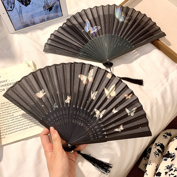 Handcrafted fan with elegant butterfly design Stornfield