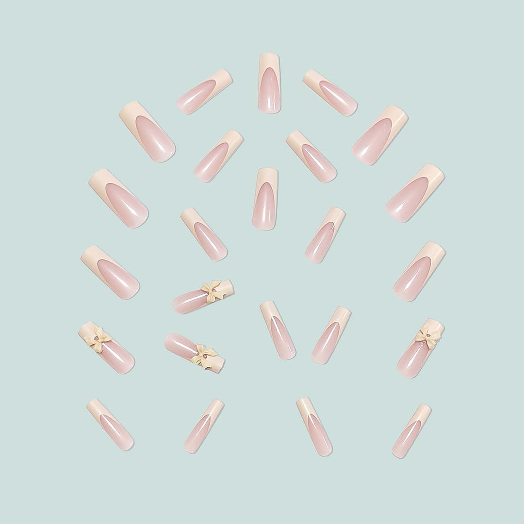 Artistic acrylic nails with bow decorations Stornfield