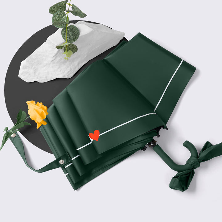 Ladies elegant folding umbrella with heart-shaped design Stornfield