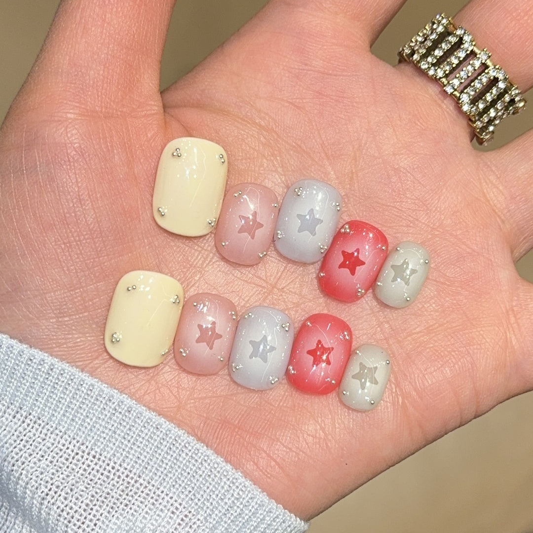 Artificial nails with sparkling star motifs Stornfield