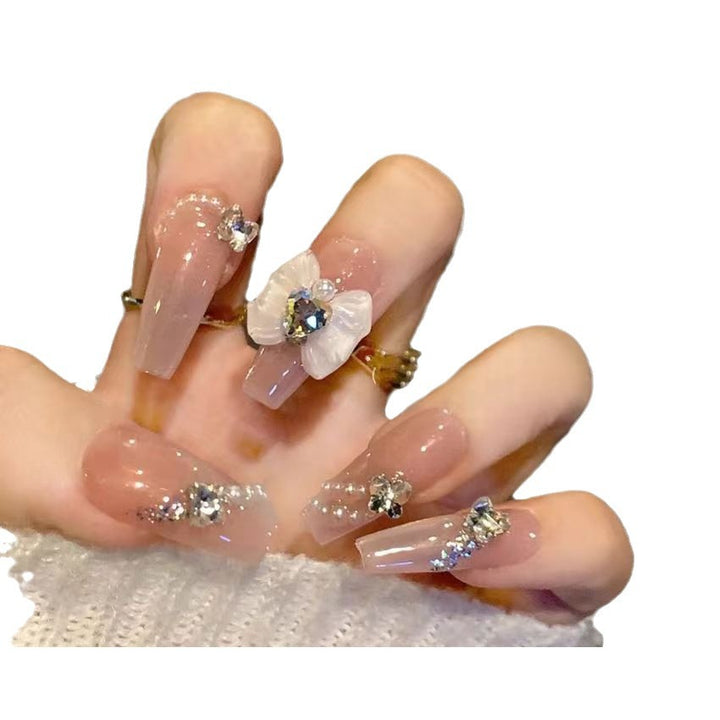 Elegant artificial nails with floral decor and glitter Stornfield