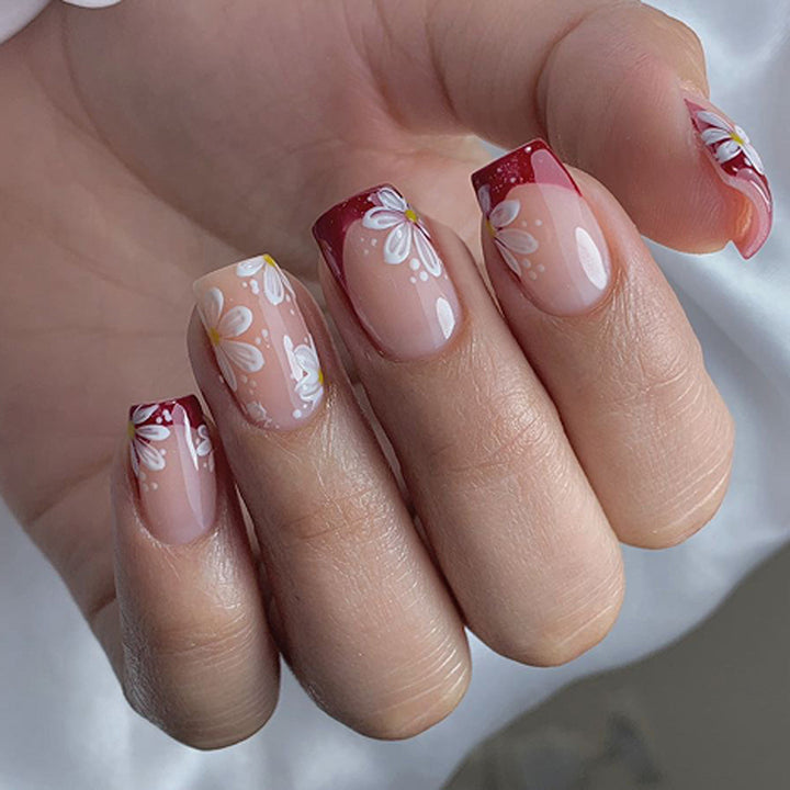 Artistic Nail Extensions with Floral Design Stornfield