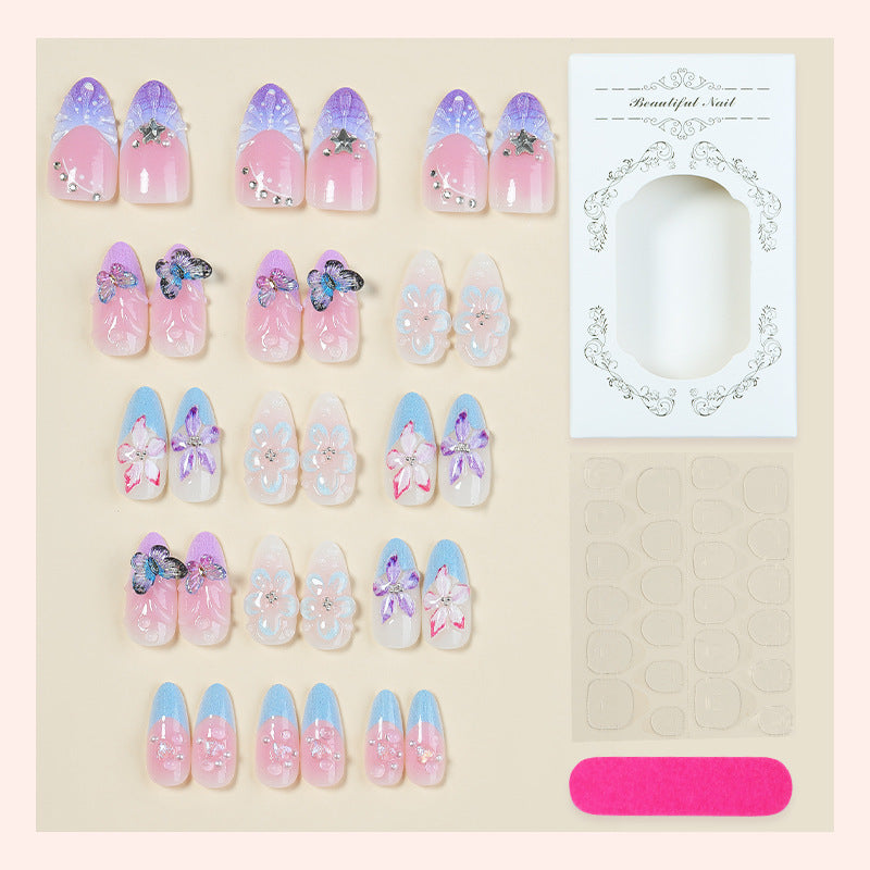 Creative nail art set with floral and butterfly motifs Stornfield