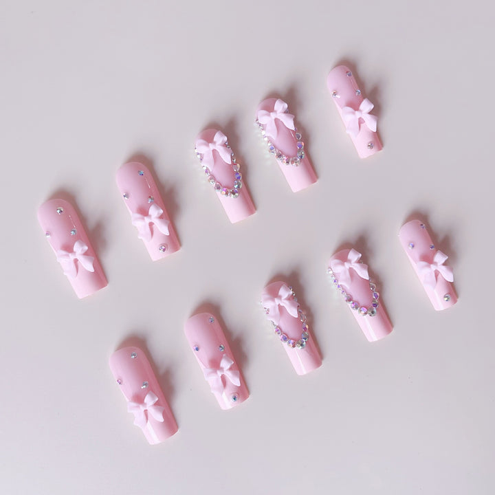 Nail art set with delicate arch decorations and rhinestone details Stornfield