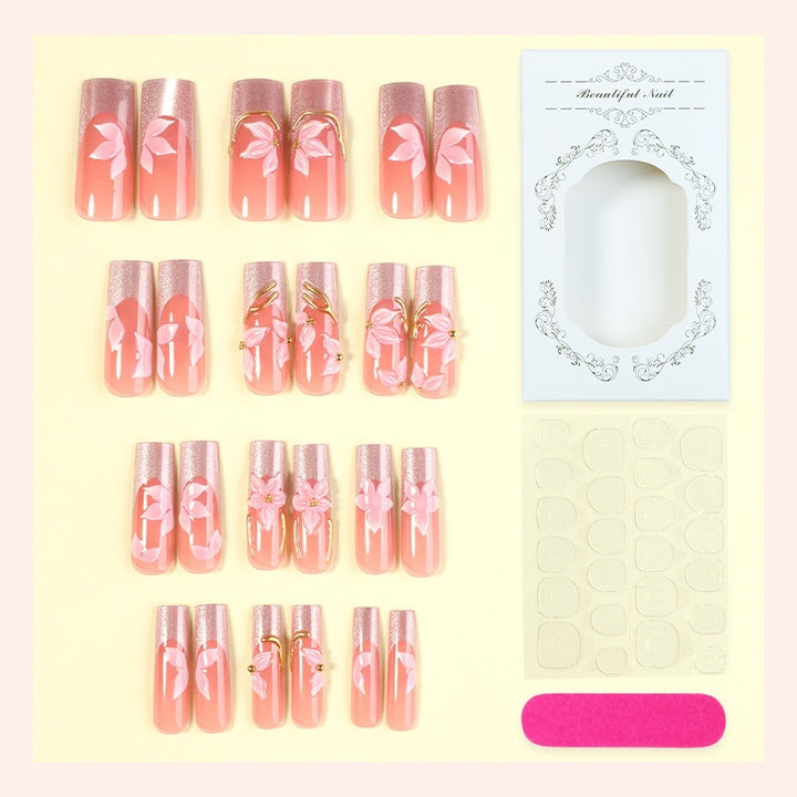 Elegant artificial nail set with floral and glitter elements Stornfield