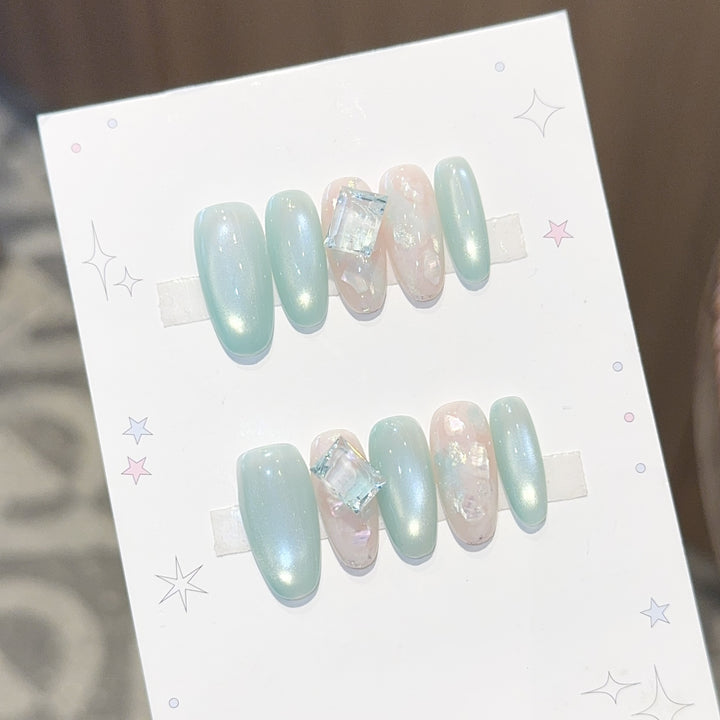 Glamorous artificial nails with shimmering accents Stornfield