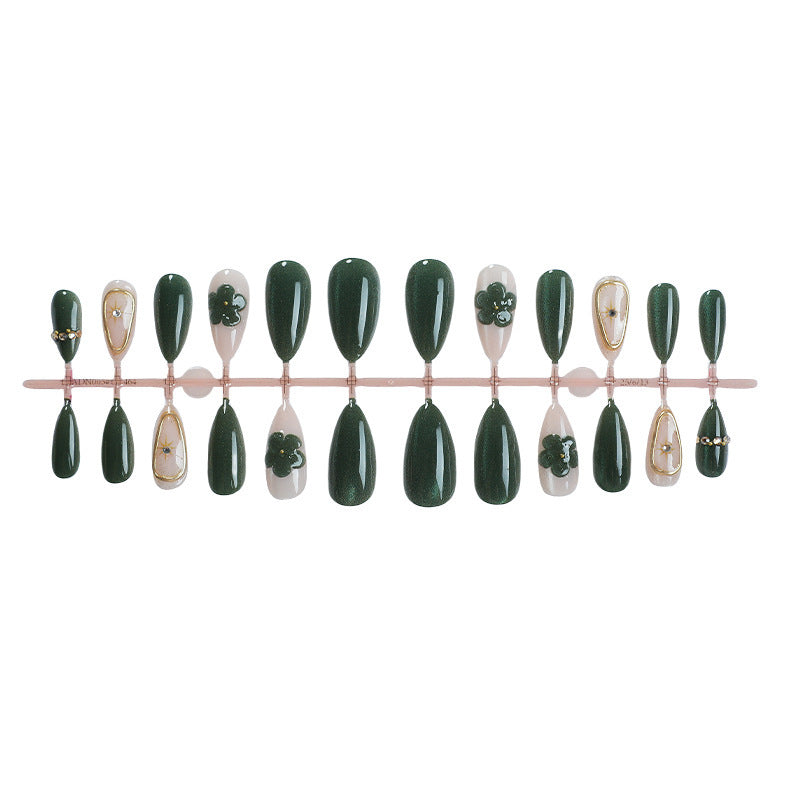 Artificial nail set with floral accents and glitter details Stornfield