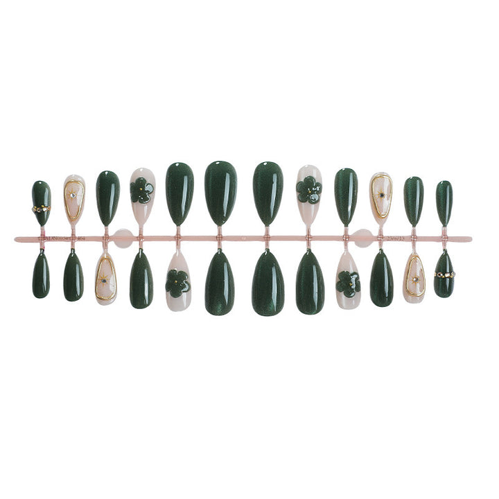 Artificial nail set with floral accents and glitter details Stornfield