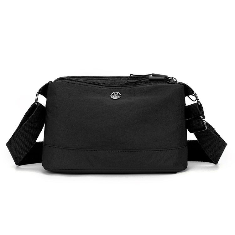 Shoulder bag with adjustable carrying strap and intelligent compartment system Stornfield