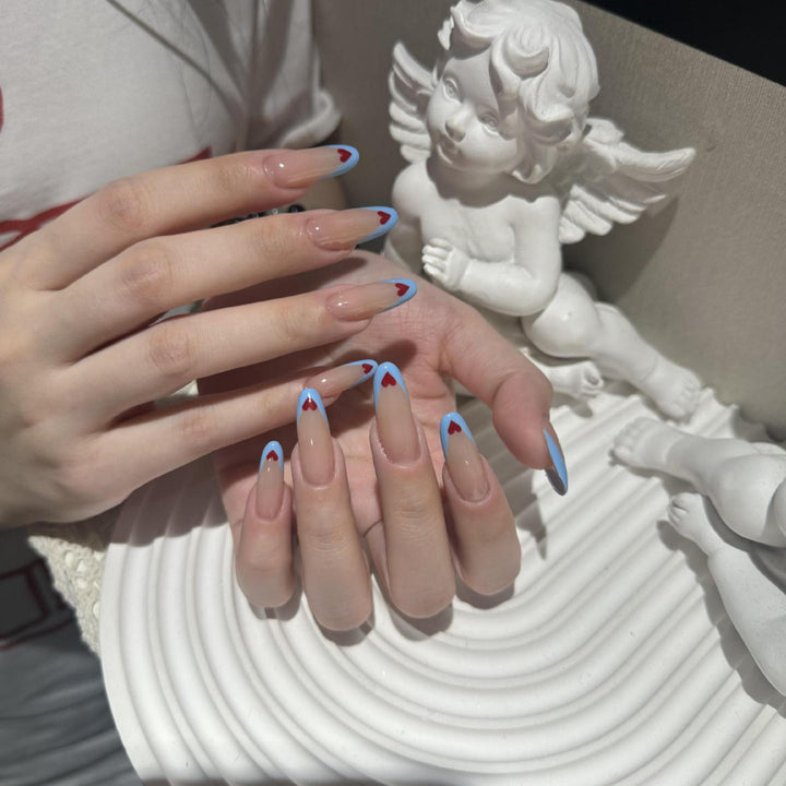 Nail art with heart-shaped design Stornfield
