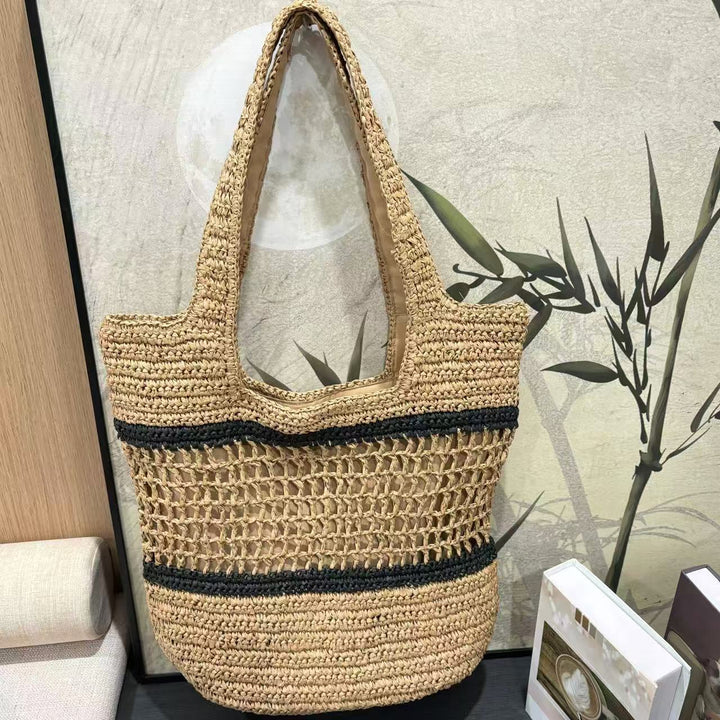 Woven natural material handbag with elegant structure Stornfield