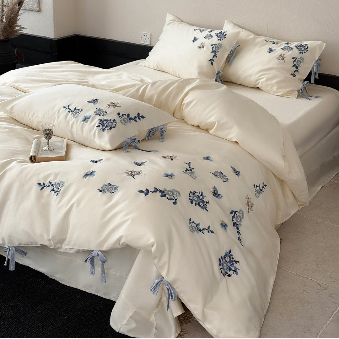 Luxury Cotton Sateen Bed Linen Set with Hand-Style Blue Floral Embroidery & Bow-Tie Shams