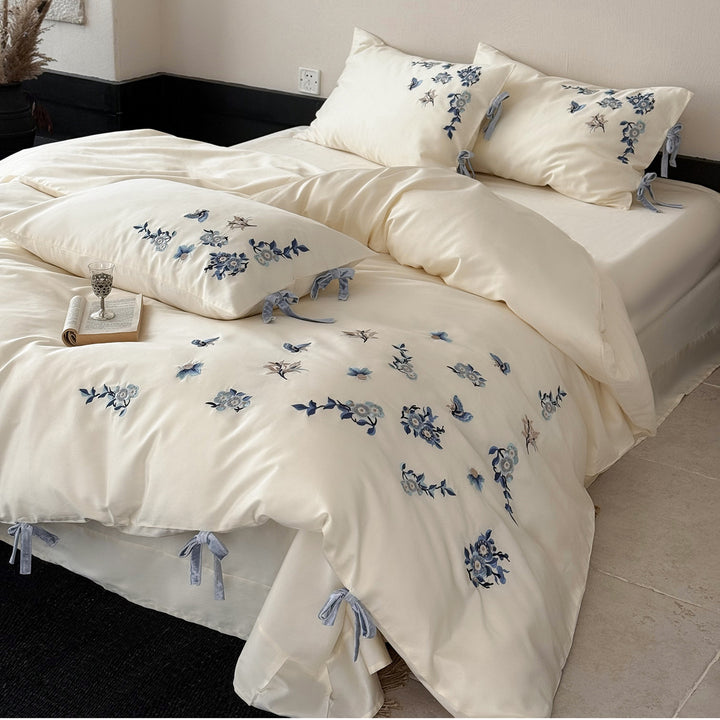 Luxury Cotton Sateen Bed Linen Set with Hand-Style Blue Floral Embroidery & Bow-Tie Shams