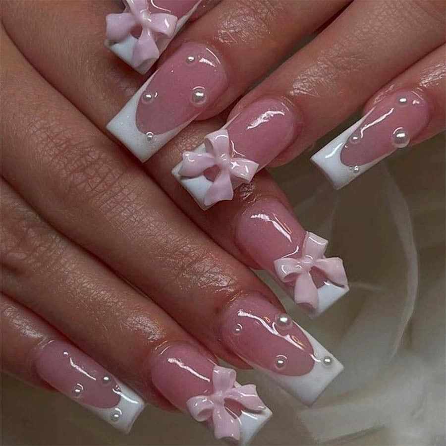 Artificial nail set with elegant bow and pearl decorations Stornfield