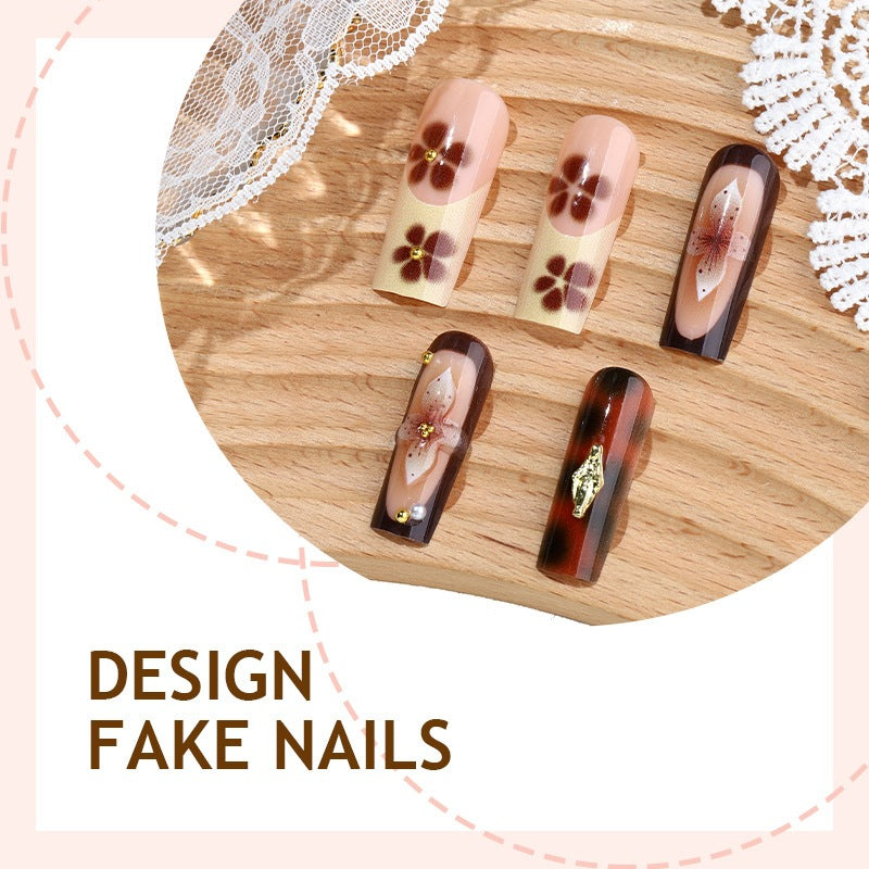 Artificial Nail Art with floral and glamorous design Stornfield